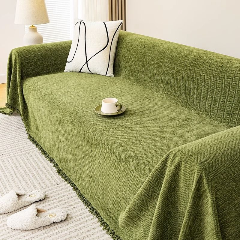 HERRAVIXA – Herringbone Sofa Cover with Decorative Fringe Detail