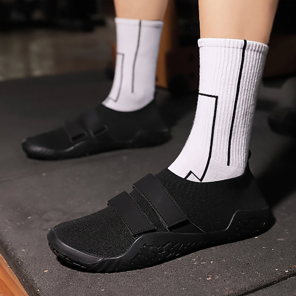 SQUATBASE - Flat training shoes designed for stability in squats and lifting