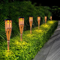TIKIGLOW - Solar bamboo LED flame lights for warm outdoor ambiance and garden décor