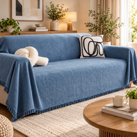 HERRAVIXA – Herringbone Sofa Cover with Decorative Fringe Detail