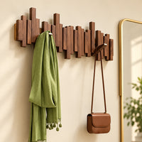 PIANOVEX – Klavier-inspirierte Wandgarderobe mit klappbaren Haken