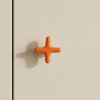 CRUXELLE – Krydsdesignede skabsknopper til kunstnerisk boligindretning