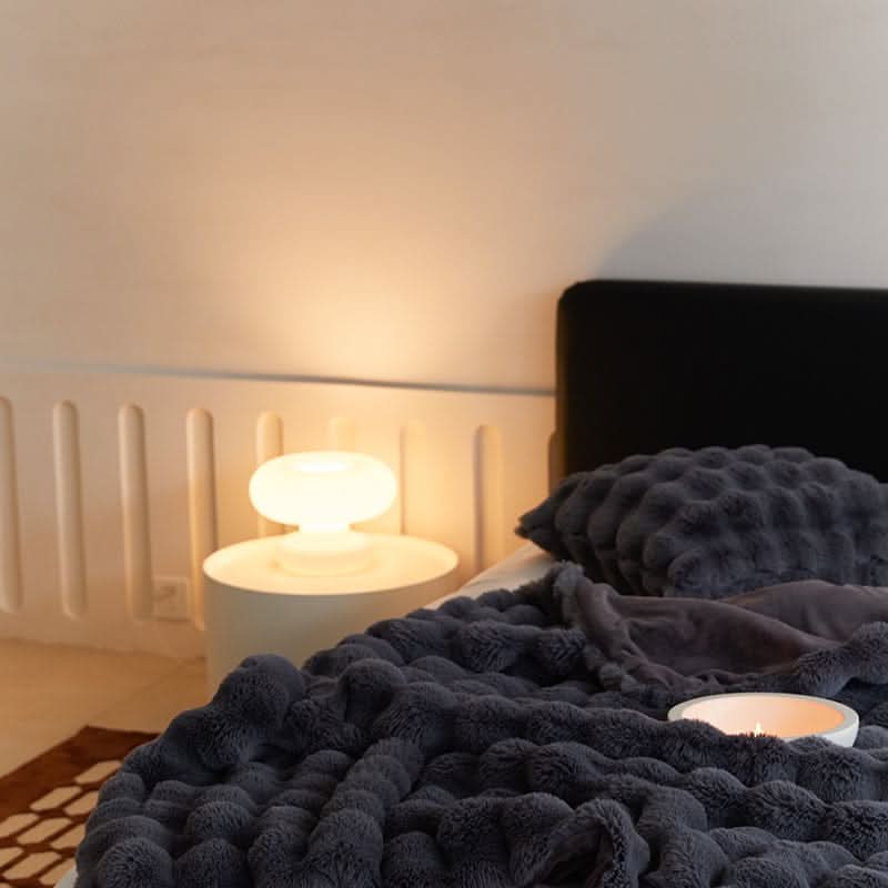 CURVORA – Skulpturelt plaid til hyggelige, moderne rum