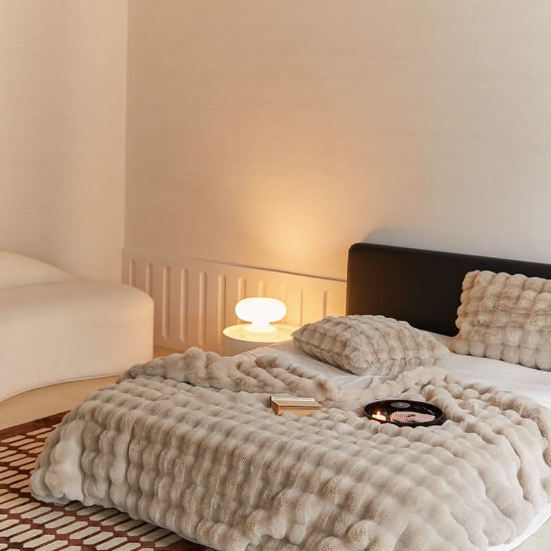 CURVORA – Skulpturelt plaid til hyggelige, moderne rum