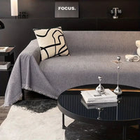 HERRAVIXA – Herringbone Sofa Cover with Decorative Fringe Detail