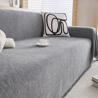 HERRAVIXA – Herringbone Sofa Cover with Decorative Fringe Detail