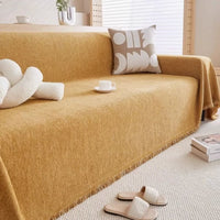 HERRAVIXA – Herringbone Sofa Cover with Decorative Fringe Detail
