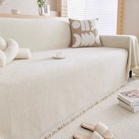 HERRAVIXA – Herringbone Sofa Cover with Decorative Fringe Detail